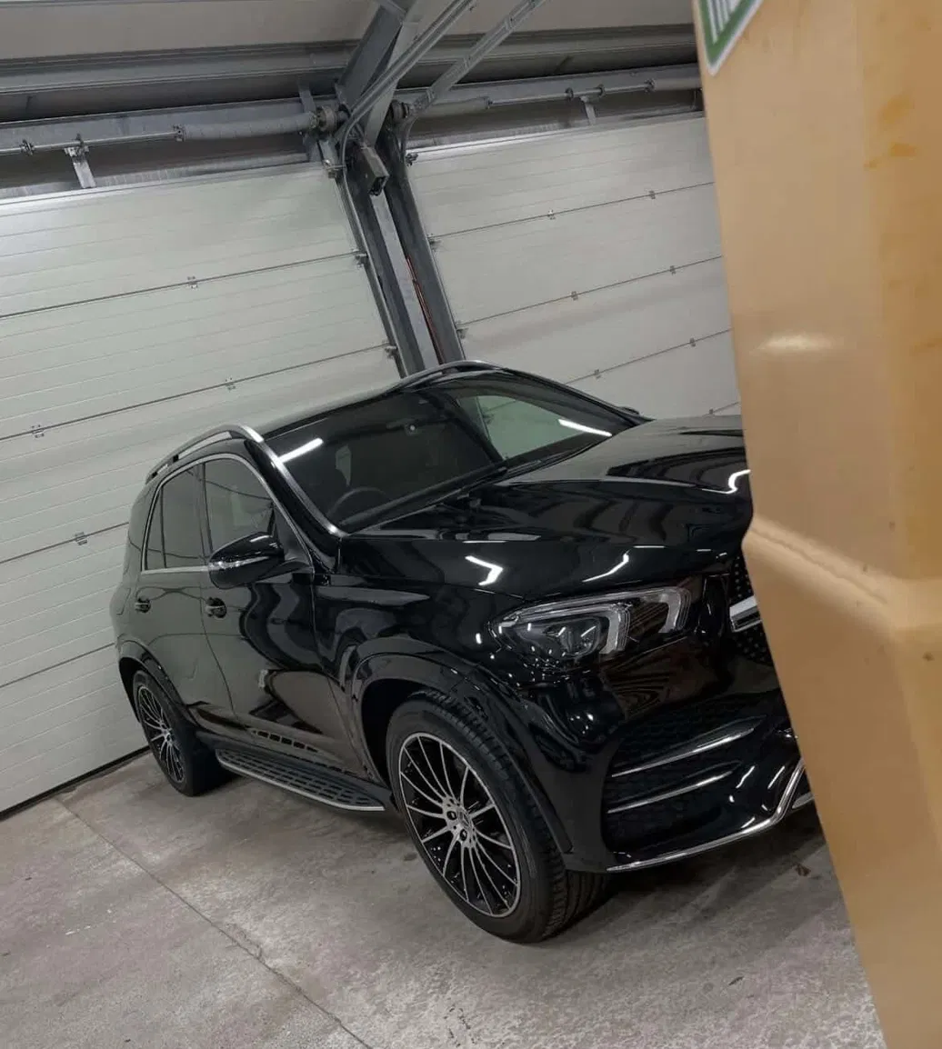 Black Mercedes GLE with a deep gloss finish after detailing